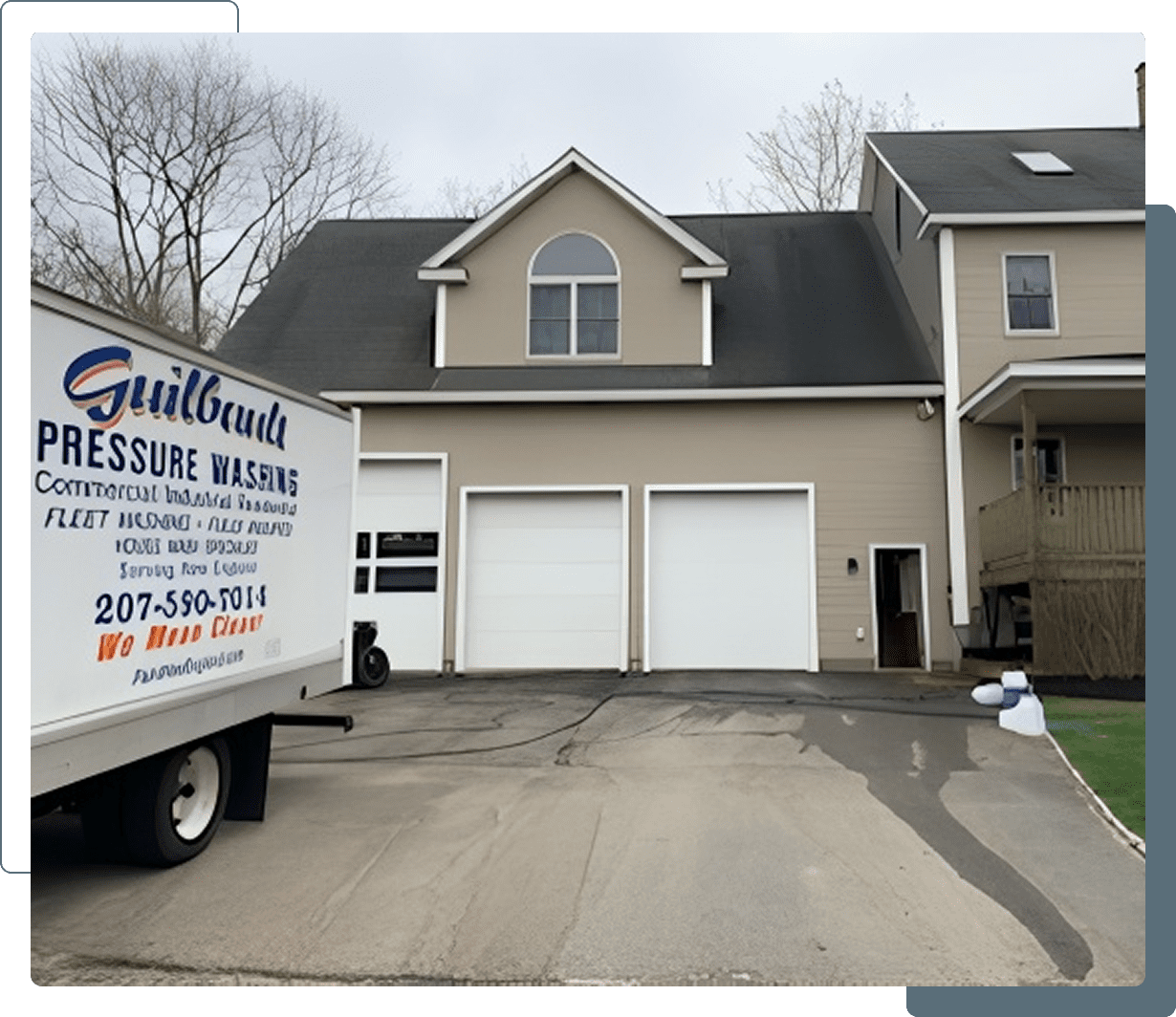 Truck parked in front of residential garage.
